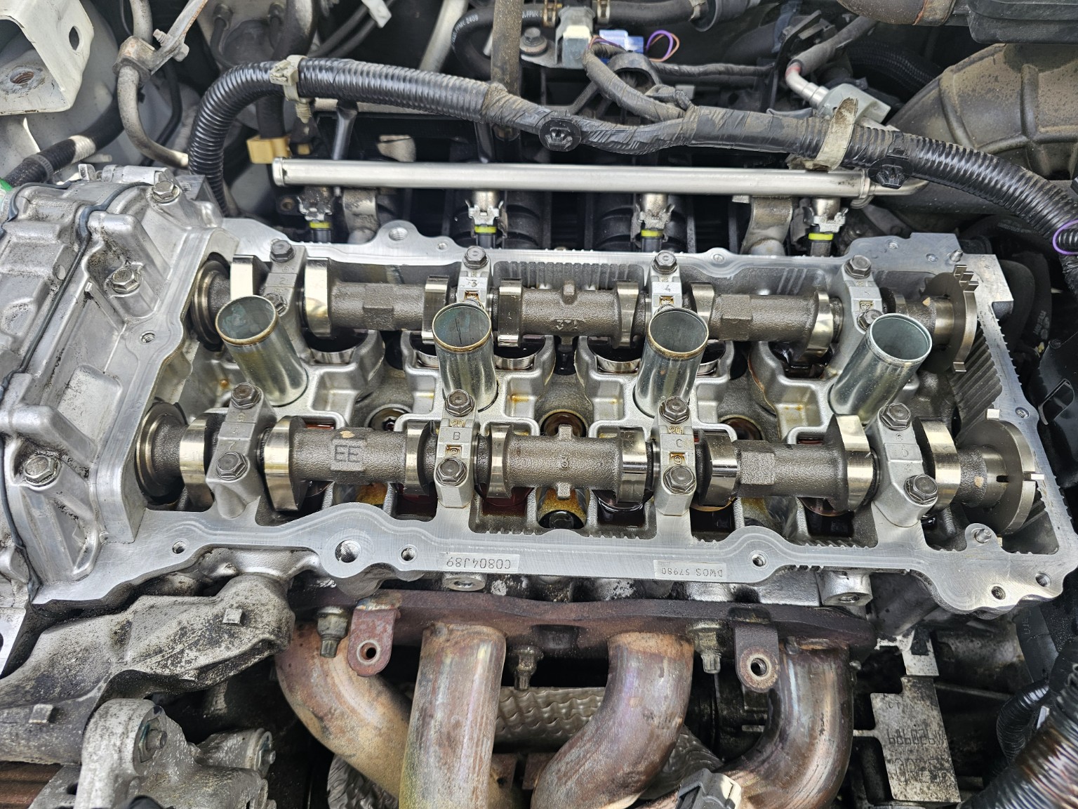 Exposed engine camshafts and valvetrain during repair