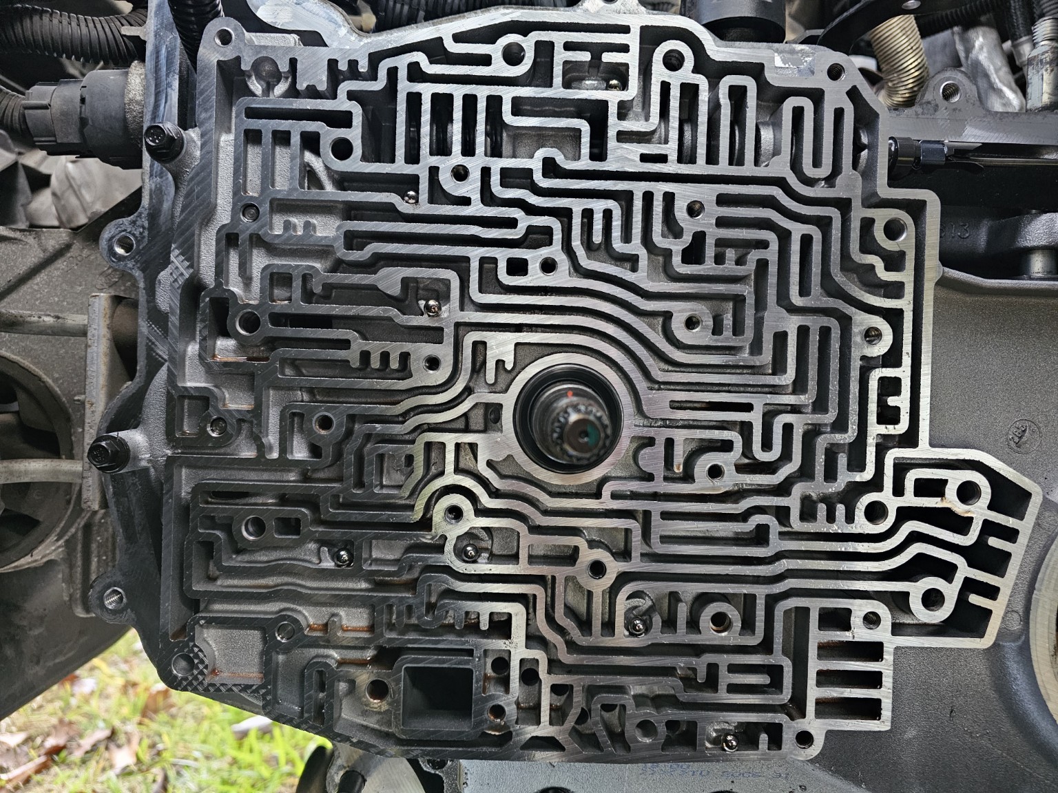 Exposed transmission valve-body channels during repair